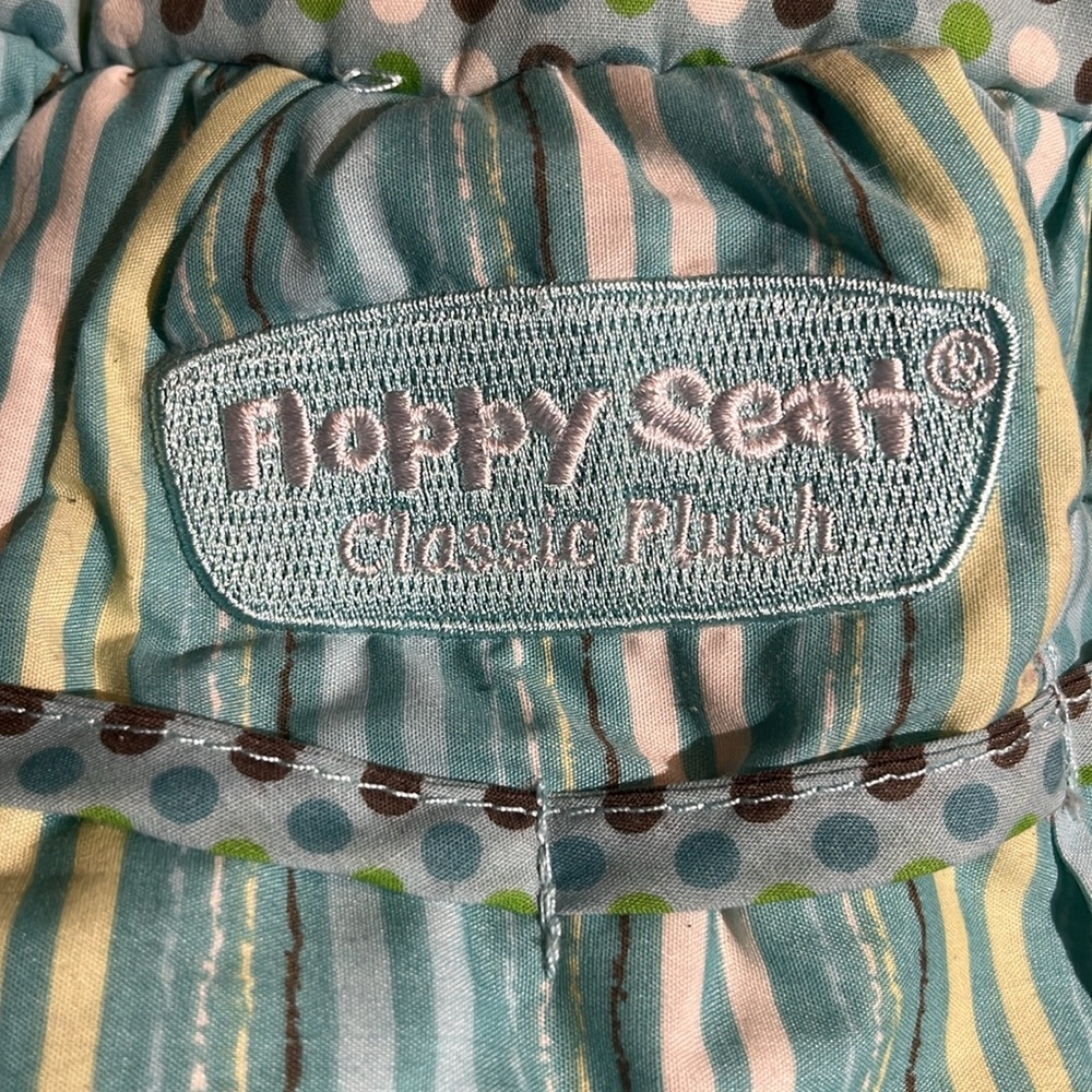 Grocery cart cover/high chair cover. Built in safety belt/EZ Carry storage bag